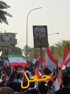 پرچم ایران در تظاهرات عراق